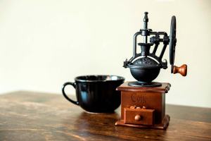 vintage coffee grinder with large cup