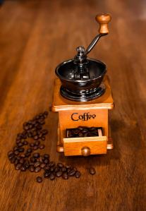 manualcoffee grinder with roasted beans